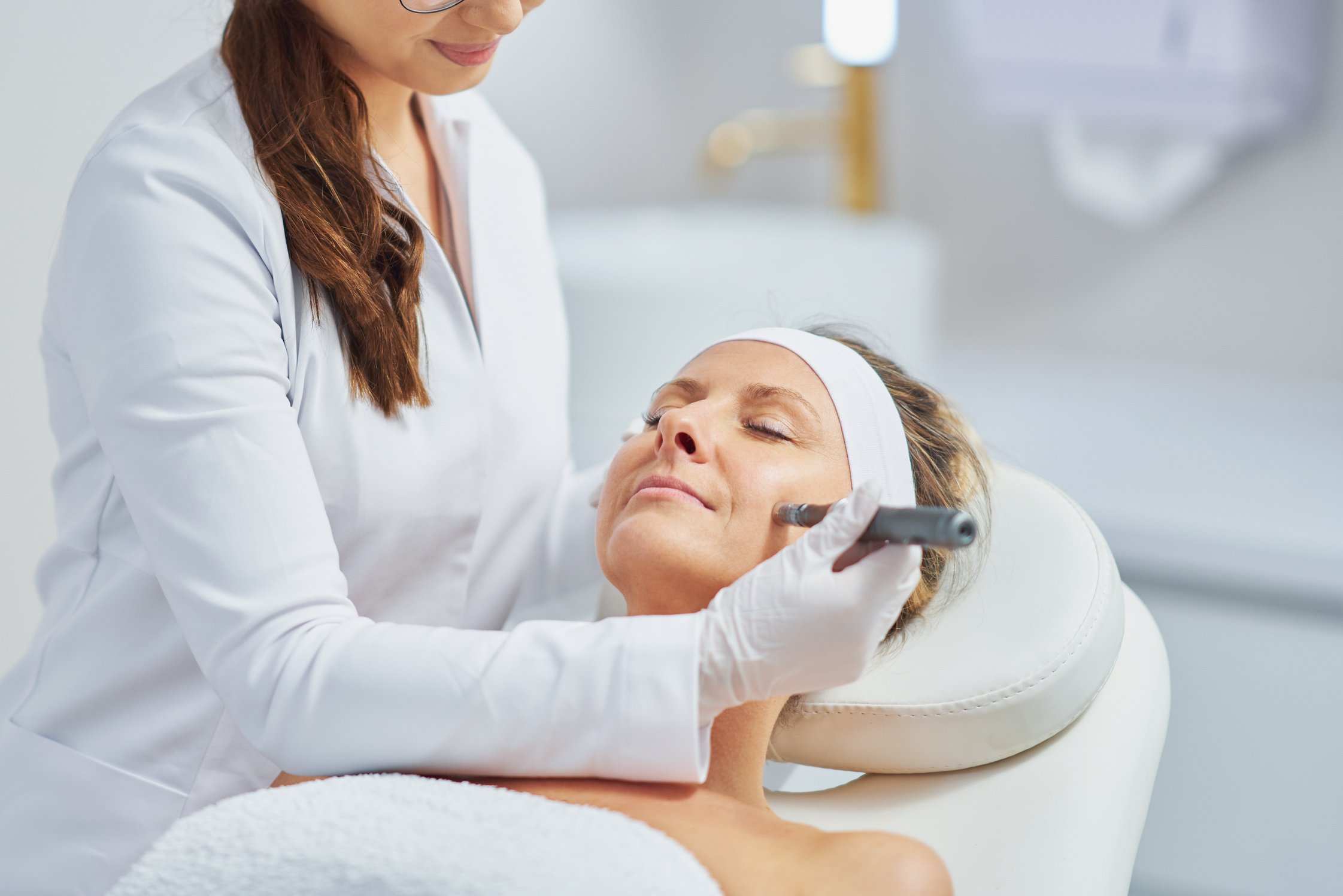 Woman in a Beauty Salon Having Needle Mesotherapy Treatment