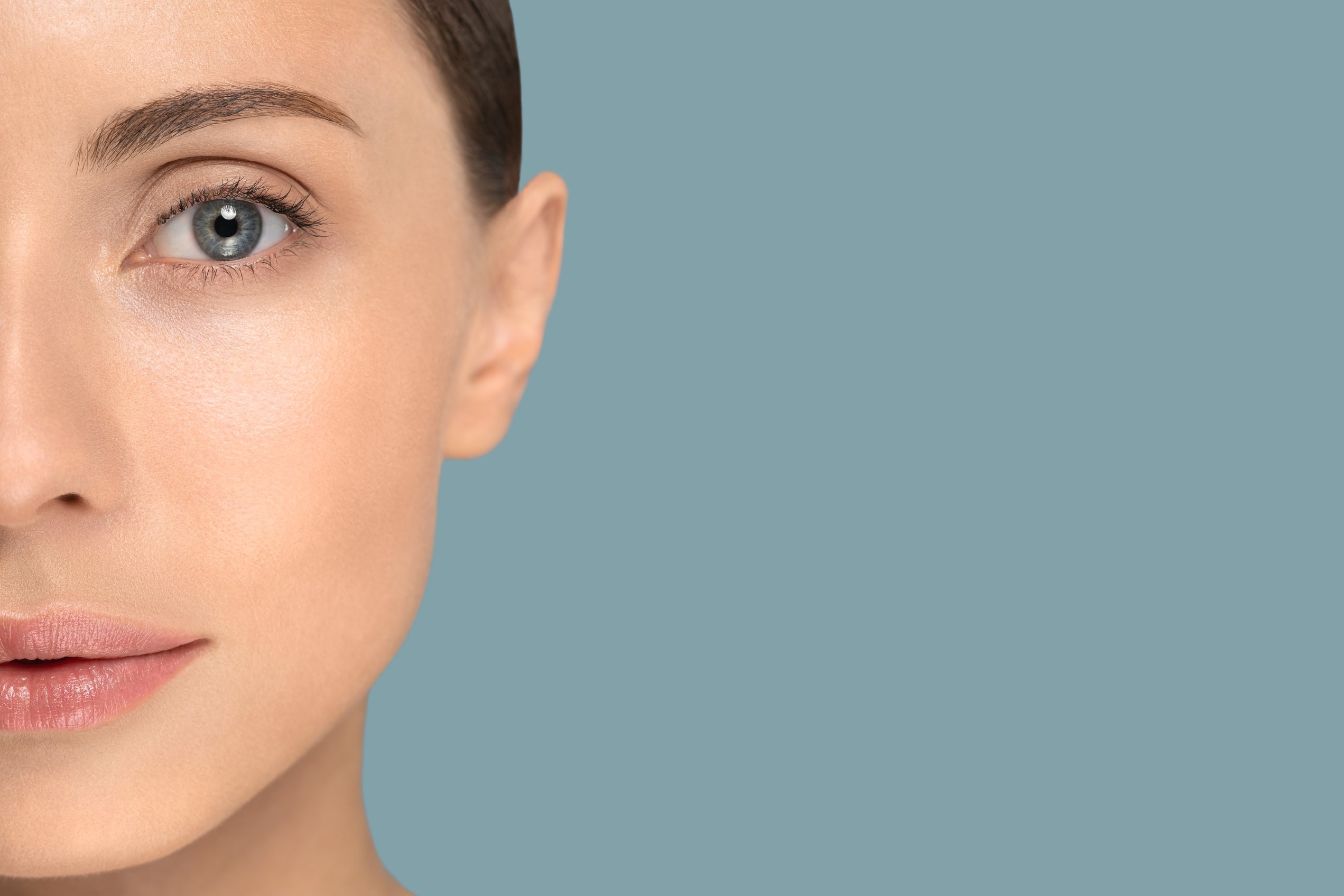 Closeup of Woman's Face with Perfect Fresh Clean Skin