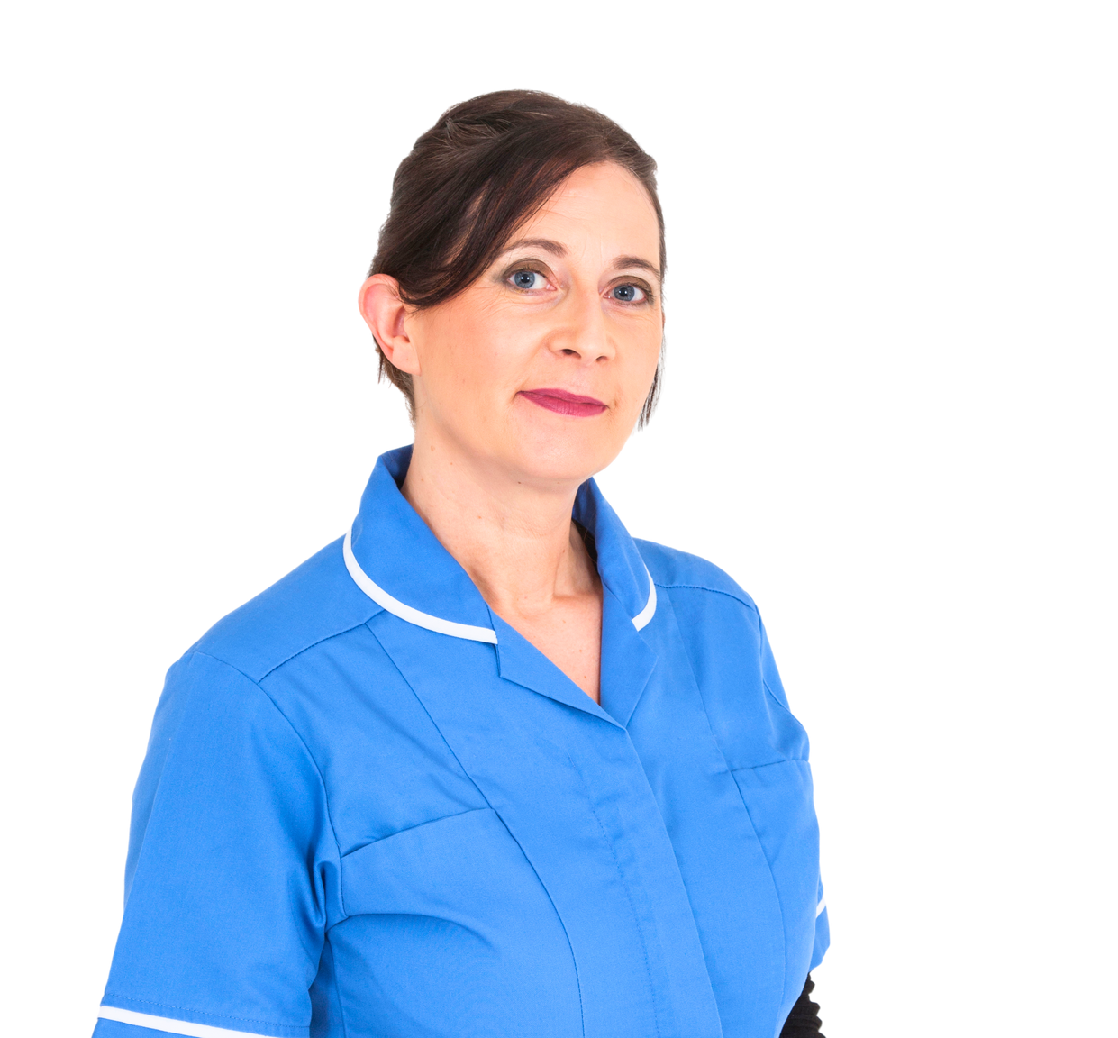 Valerie, the owner of Refresh by Valerie in a blue uniform standing in front of a white background